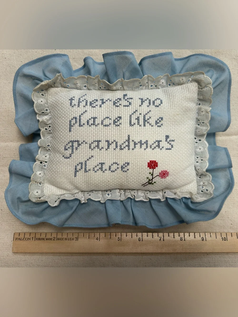 ‘There's No Place Like Grandma's Place' Blue Cross-Stitch Pillow, 10” end to end